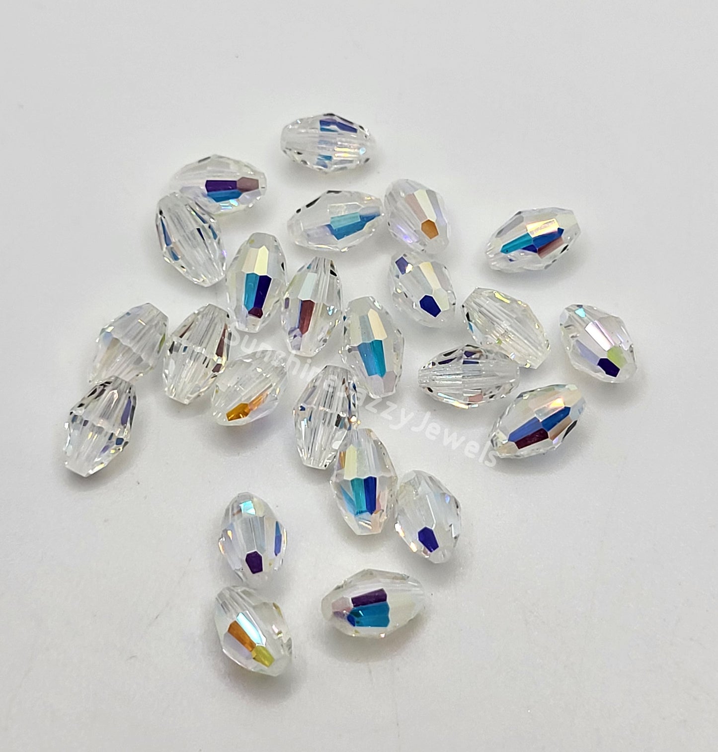 #5200 - Swarovski Crystal Clear AB Faceted Oval Beads; 7 Sizes