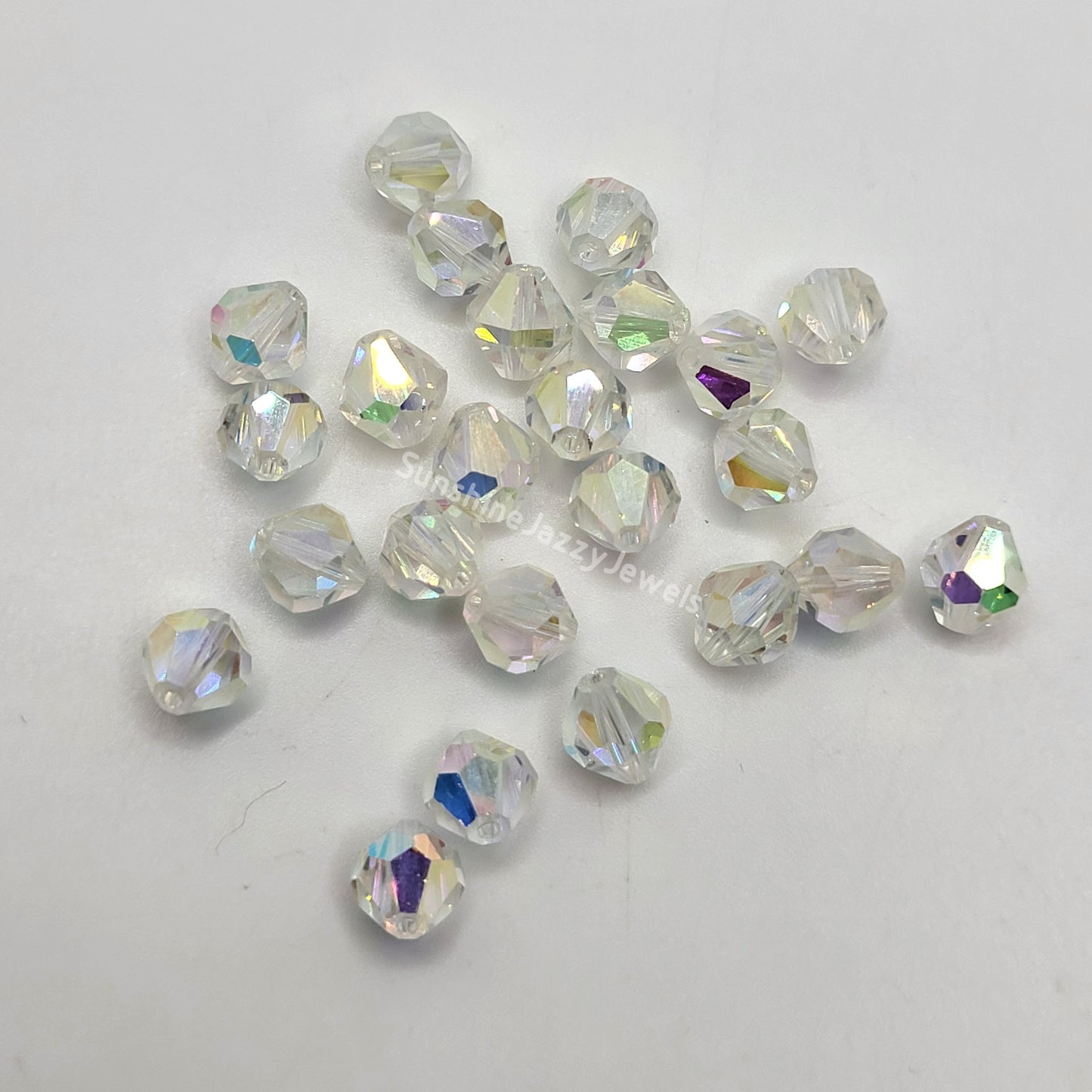#5304 - Swarovski Crystal Clear AB2X 6mm Rounded Bicone Beads; 12pc per pack
