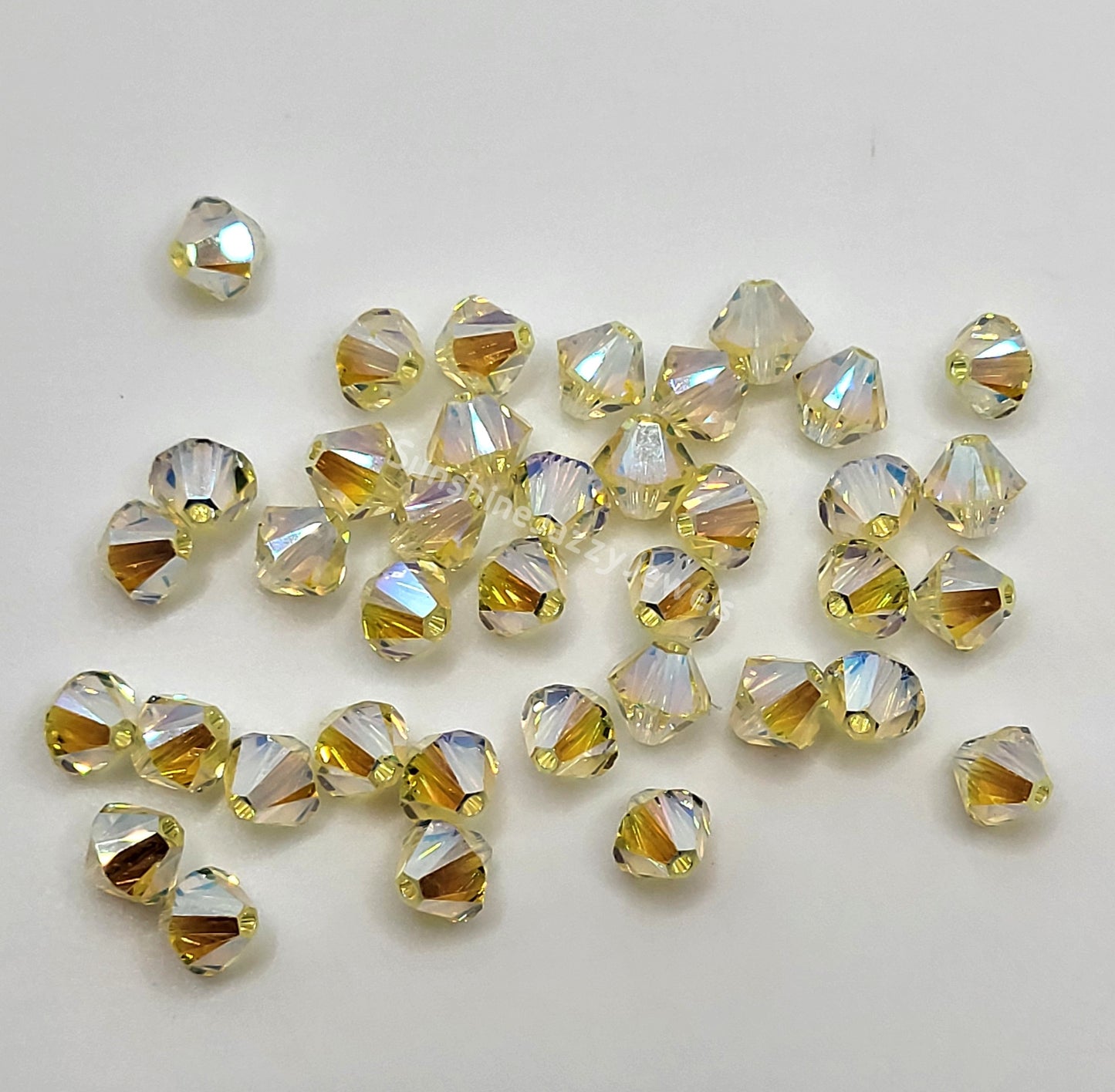 #5328 - Swarovski Crystal 6mm AB2X Bicone Beads; 12pc per pack