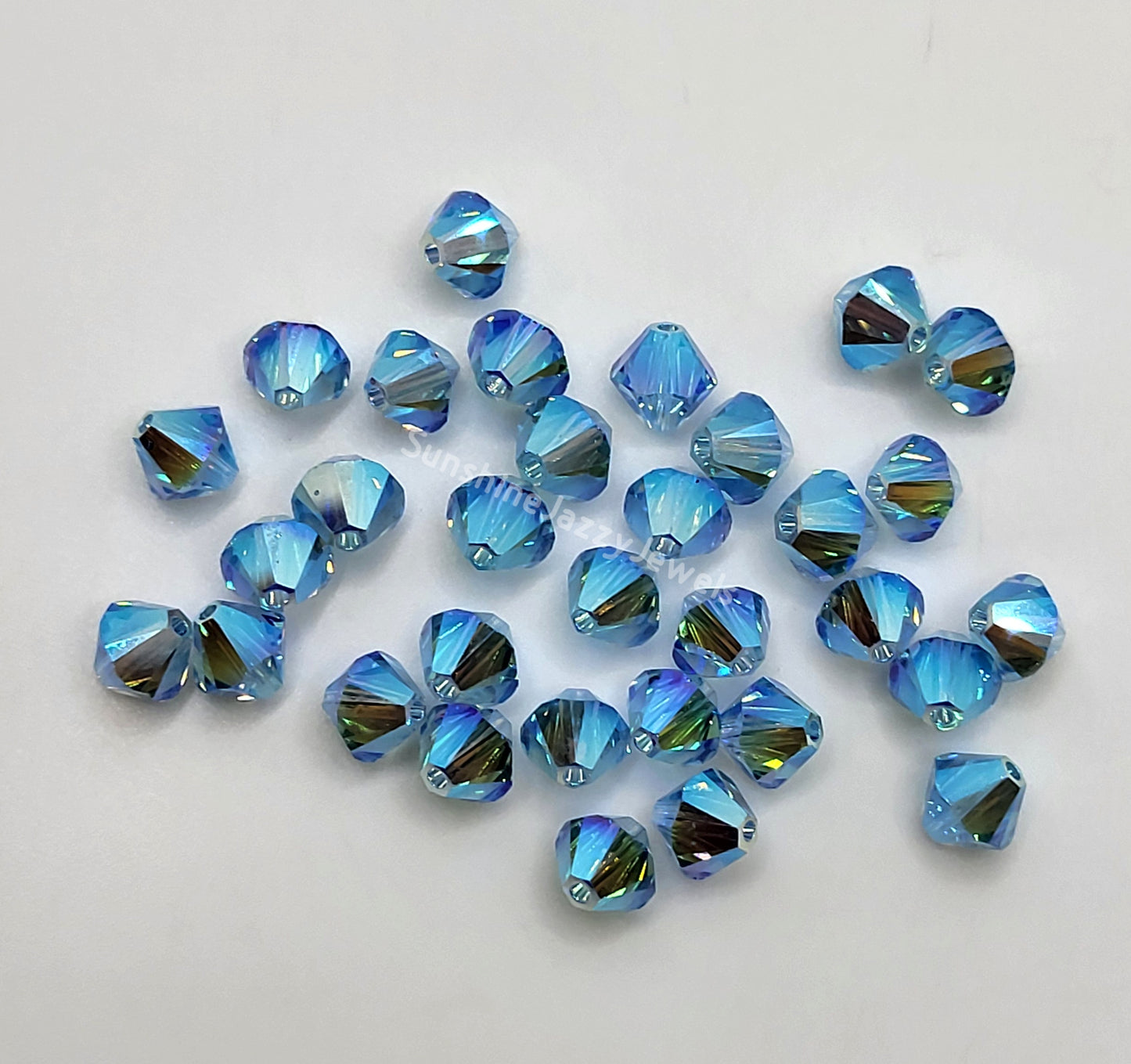 #5328 - Swarovski Crystal 6mm AB2X Bicone Beads; 12pc per pack
