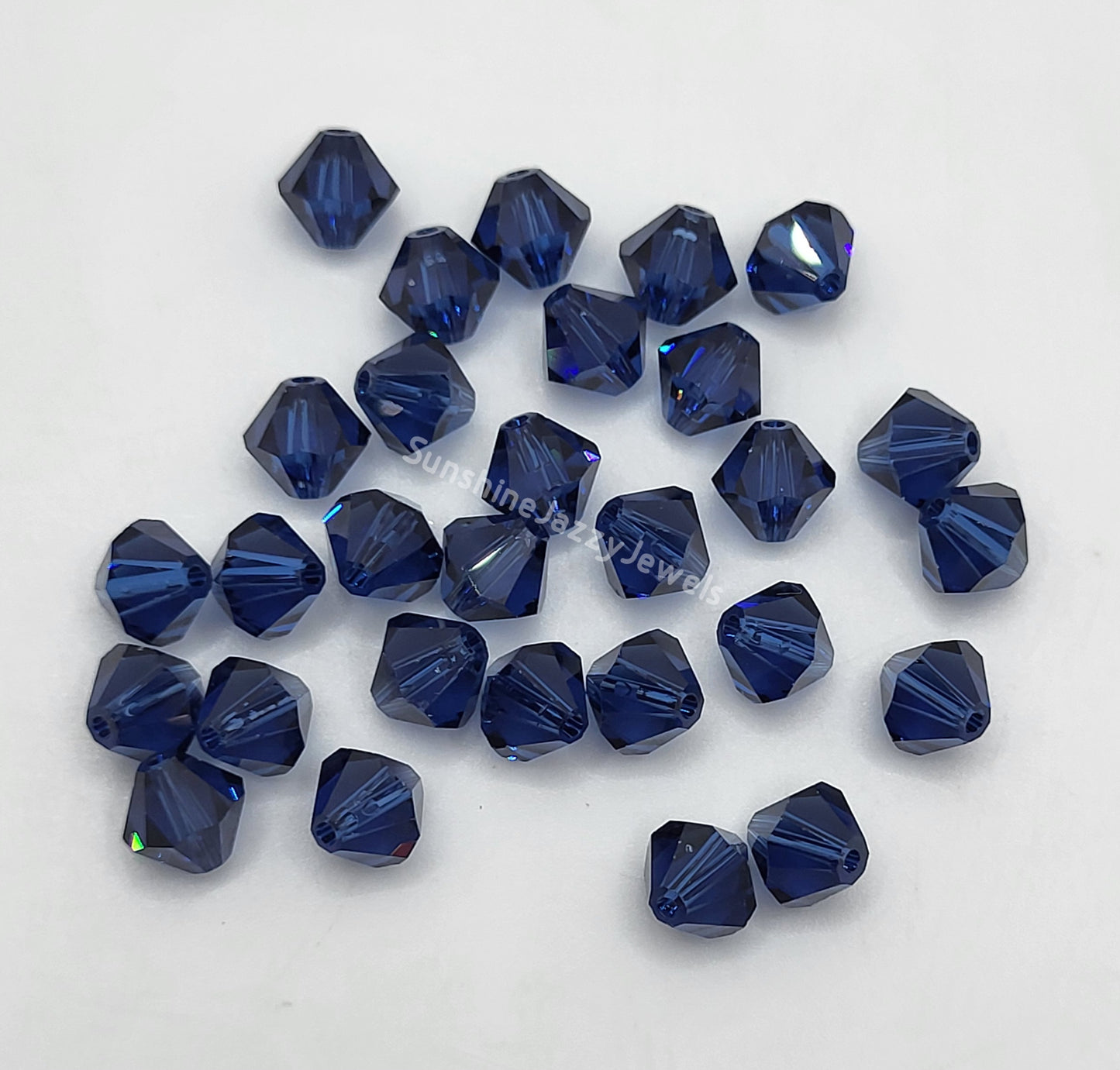 WEB EXCLUSIVE - #5301 - 12pc Swarovski Crystal Dark Sapphire 6mm Bicone Beads