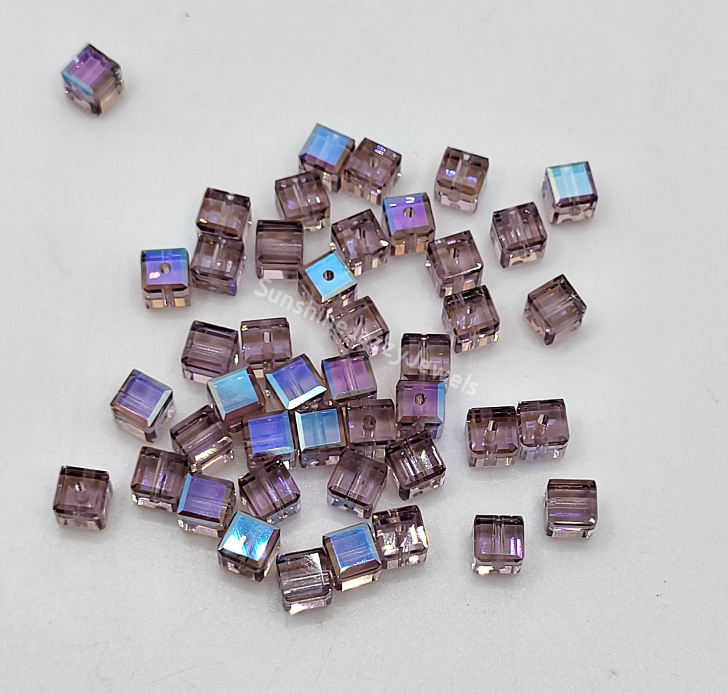 #5601 - Swarovski Crystal 4mm Faceted Cube Beads w/ AB Finish; 12pc per pack