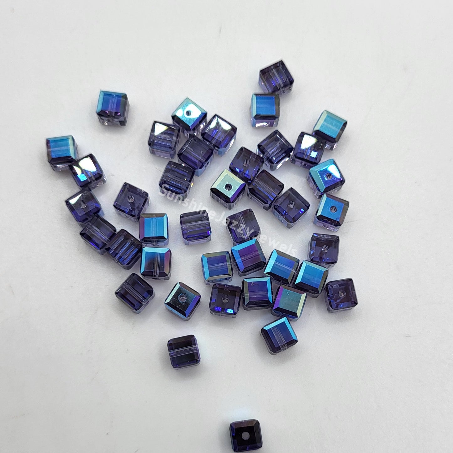 #5601 - Swarovski Crystal 4mm Faceted Cube Beads w/ AB Finish; 12pc per pack
