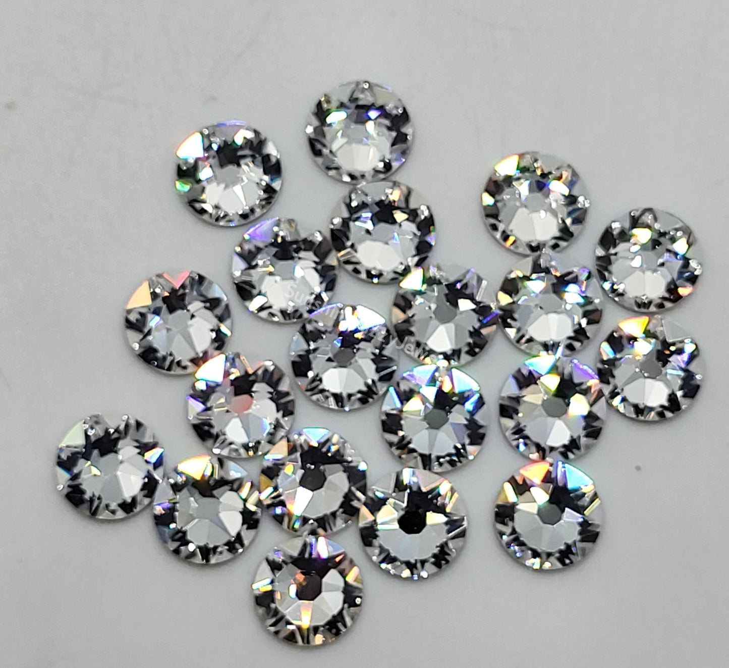 #2088 - Swarovski Crystal ss30 6mm Flatback Rhinestones; 12pc per pack