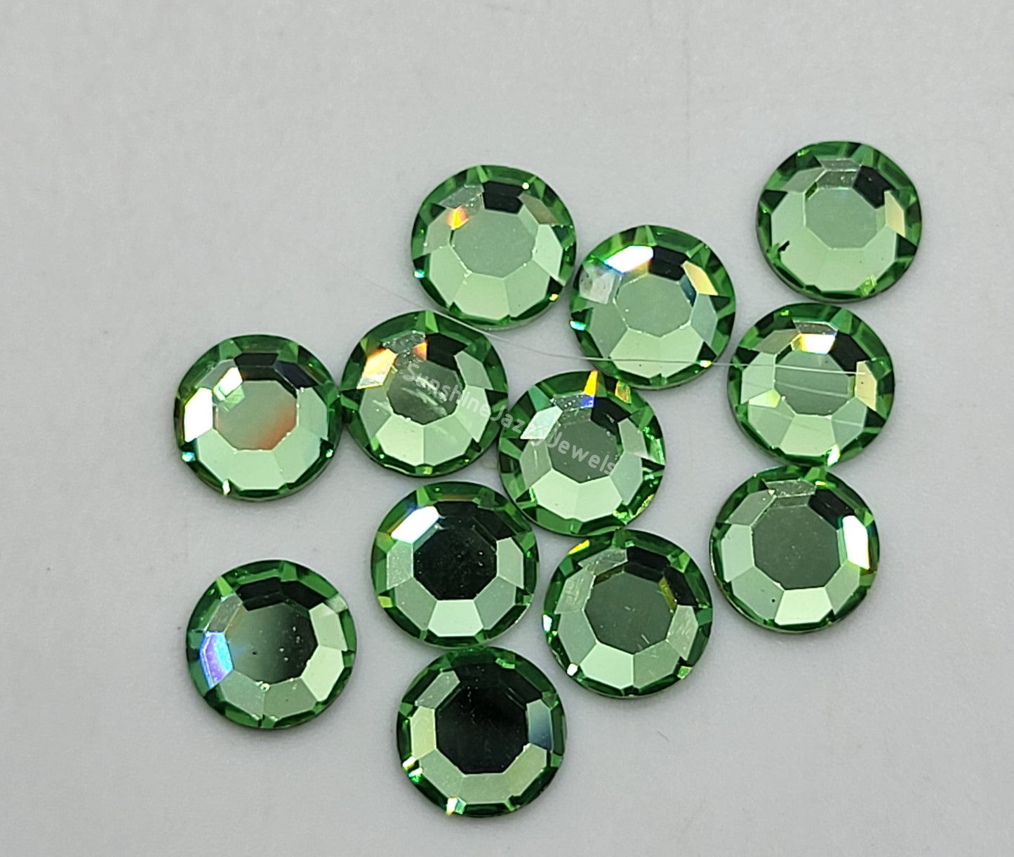 #2088 - Swarovski Crystal ss30 6mm Flatback Rhinestones; 12pc per pack