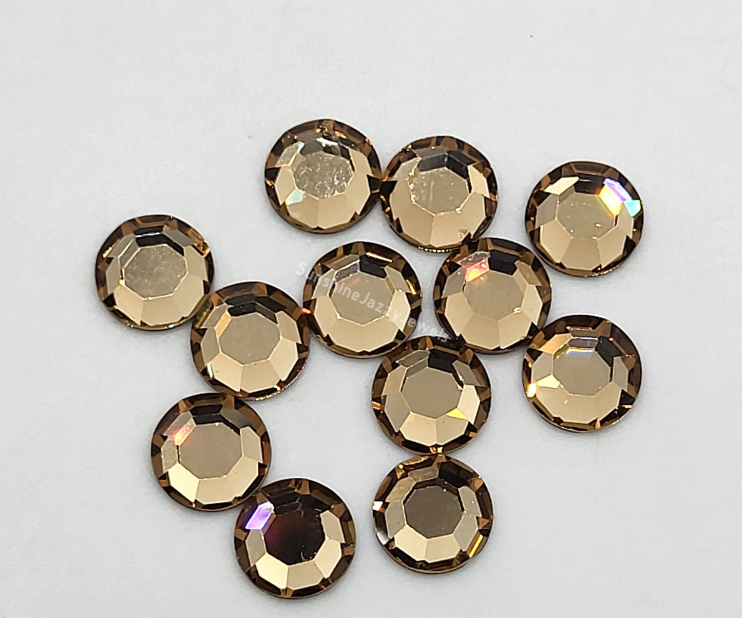 #2088 - Swarovski Crystal ss30 6mm Flatback Rhinestones; 12pc per pack