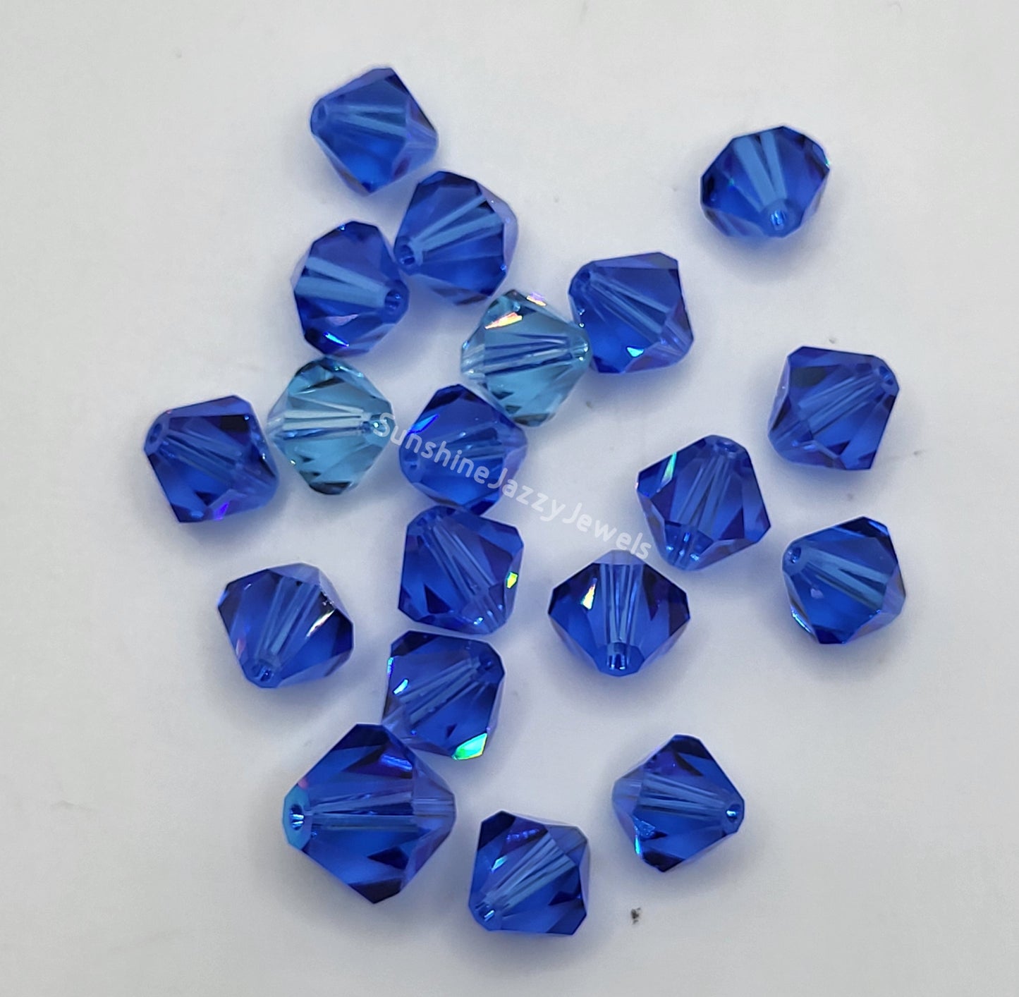 CLEARANCE MIX!  19pc Swarovski Crystal Shades of Blue 8-10mm Bicone Beads