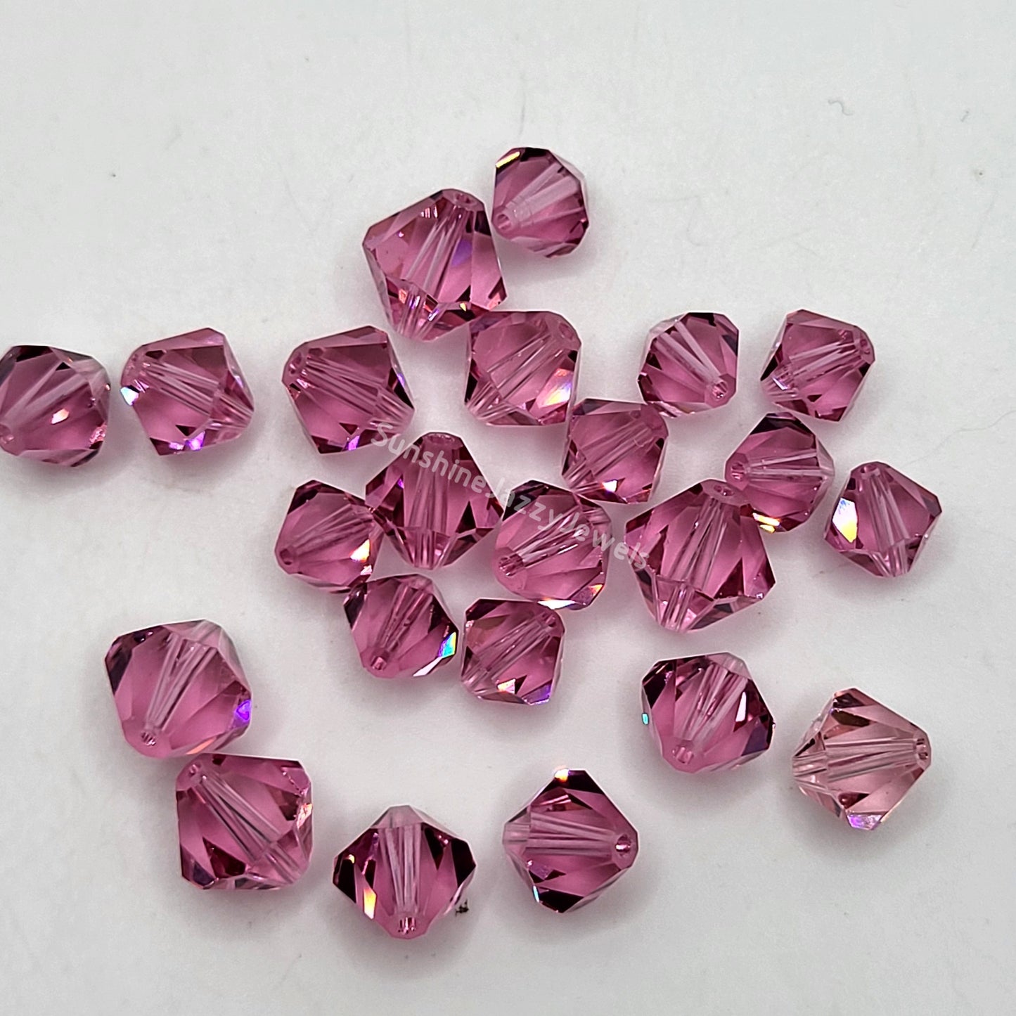 CLEARANCE MIX!  23pc Swarovski Crystal Shades of Pink 8-10mm Bicone Beads