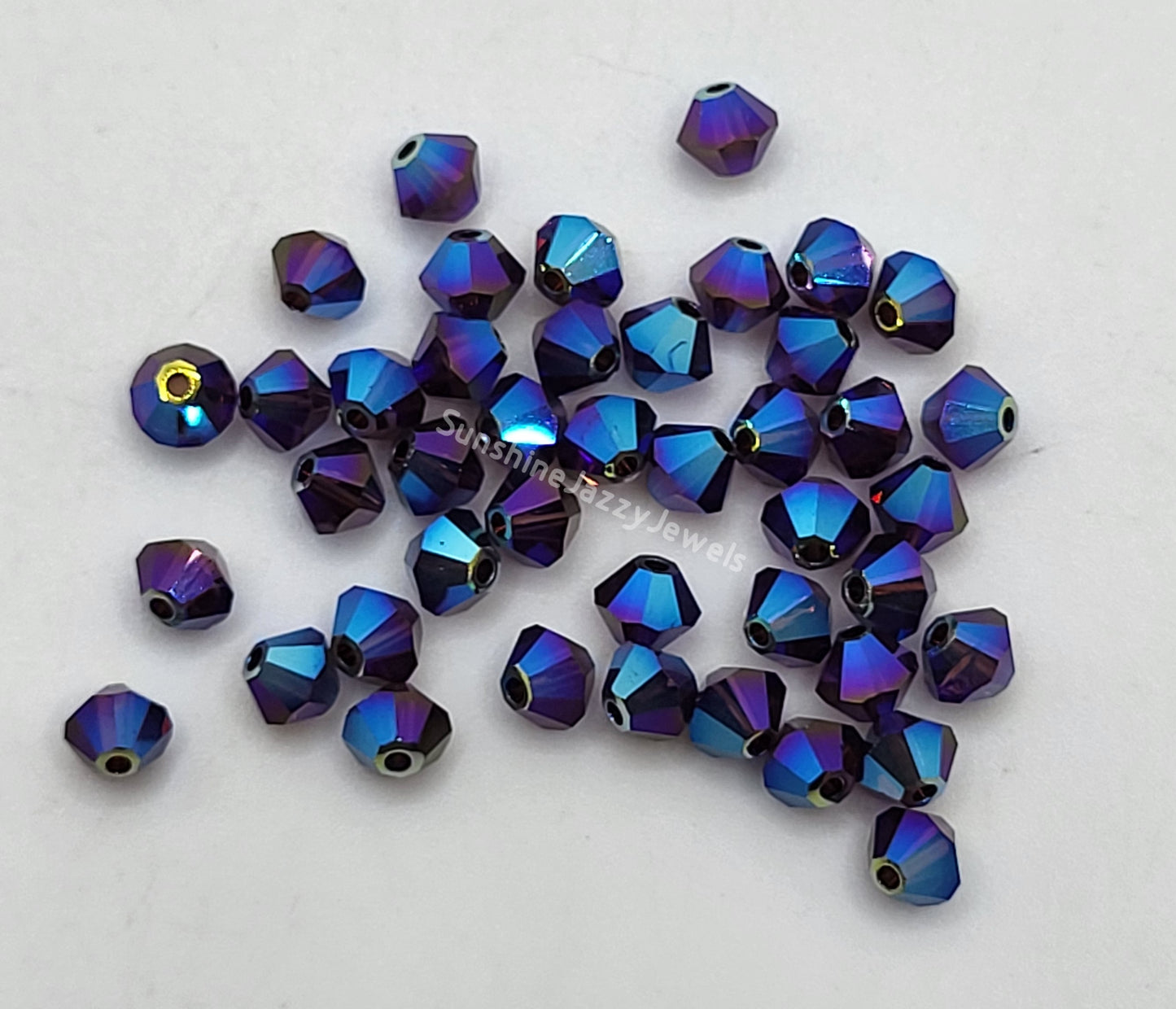 #5328 - Swarovski Crystal 4mm AB2X Bicone Beads; 24pc per pack