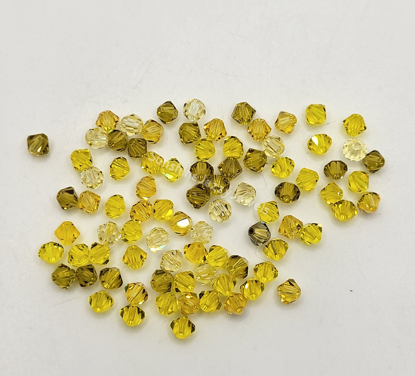 CLEARANCE MIX!  85pc Swarovski Crystal Shades of Yellow 4mm Bicone Beads