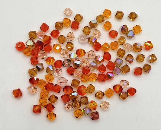 CLEARANCE MIX!  111pc Swarovski Crystal Shades of Orange 4mm Bicone Beads
