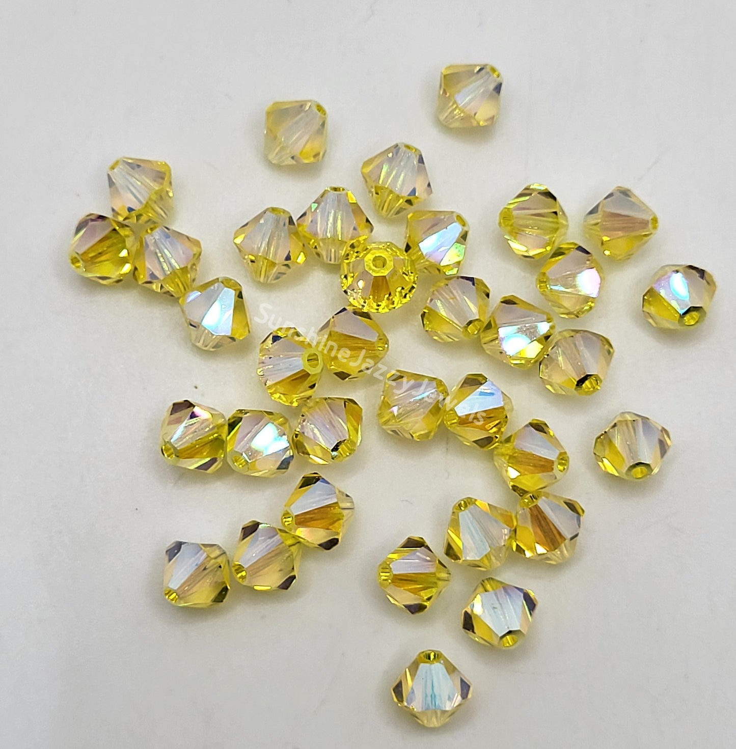 #5328 - Swarovski Crystal 6mm AB2X Bicone Beads; 12pc per pack