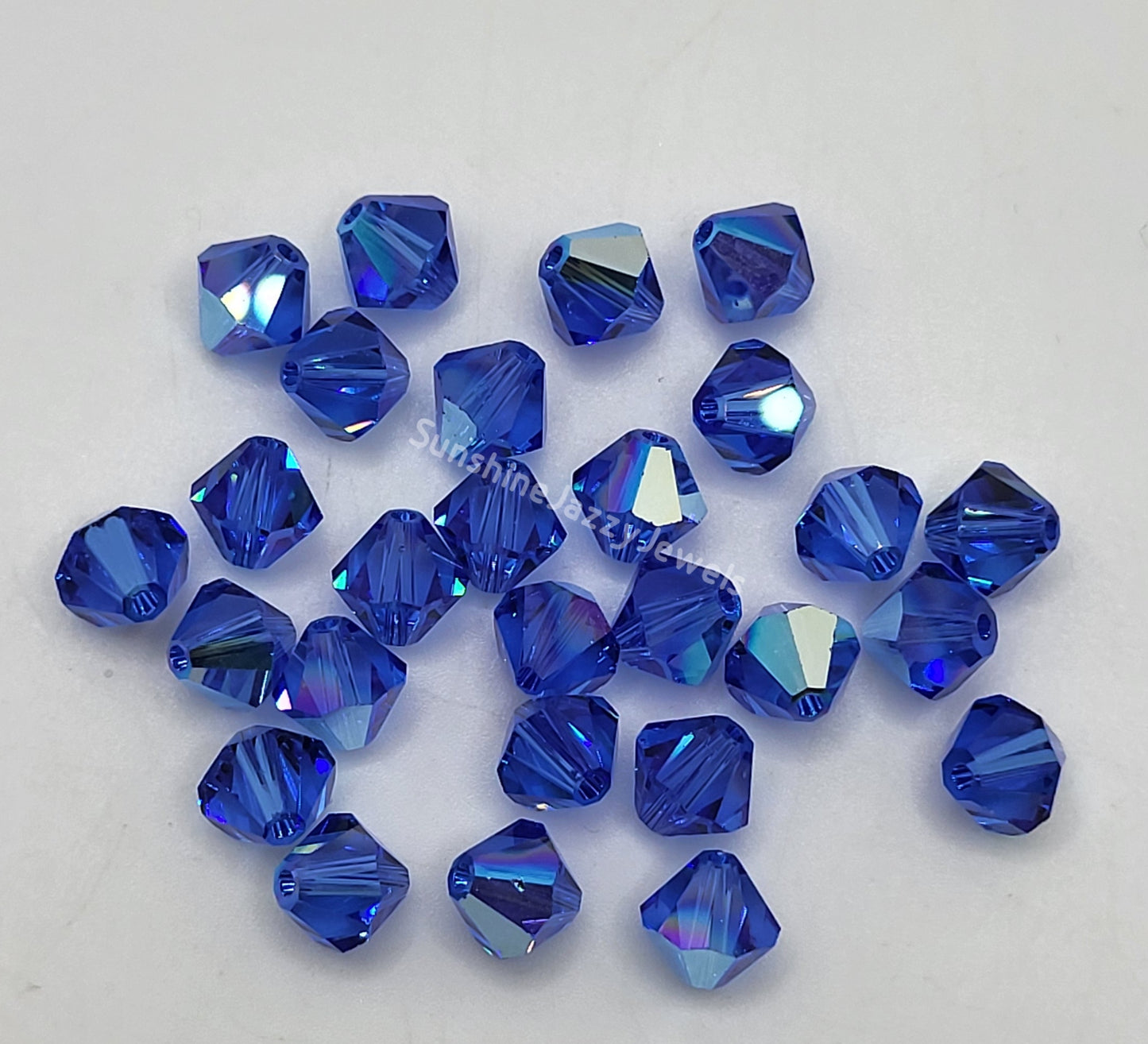#5328 - Swarovski Crystal 6mm Bicone w/ AB Finish; 12pc per pack