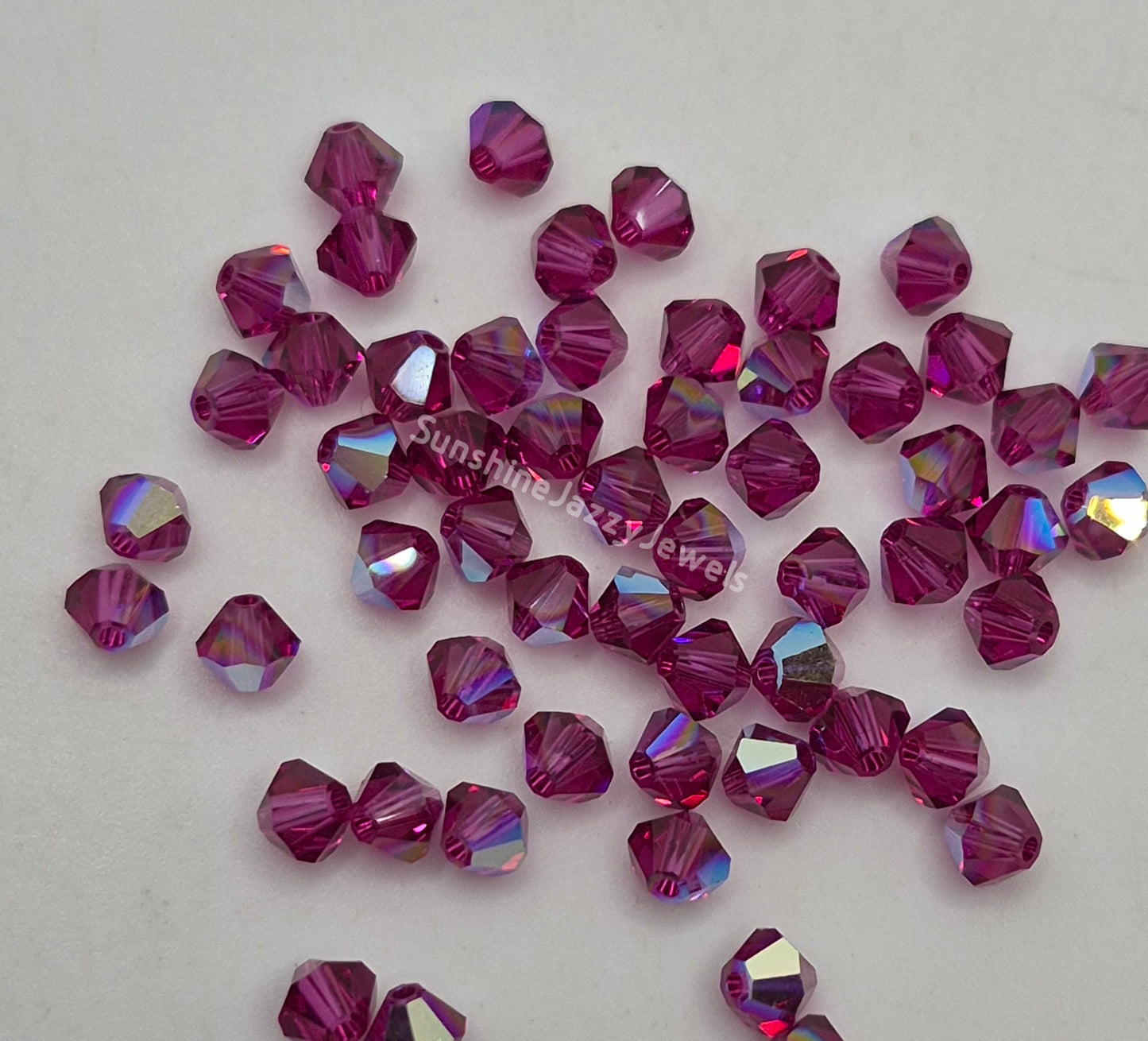 #5328 - Swarovski Crystal 4mm Bicone Beads w/ AB Finish; 24pc per pack