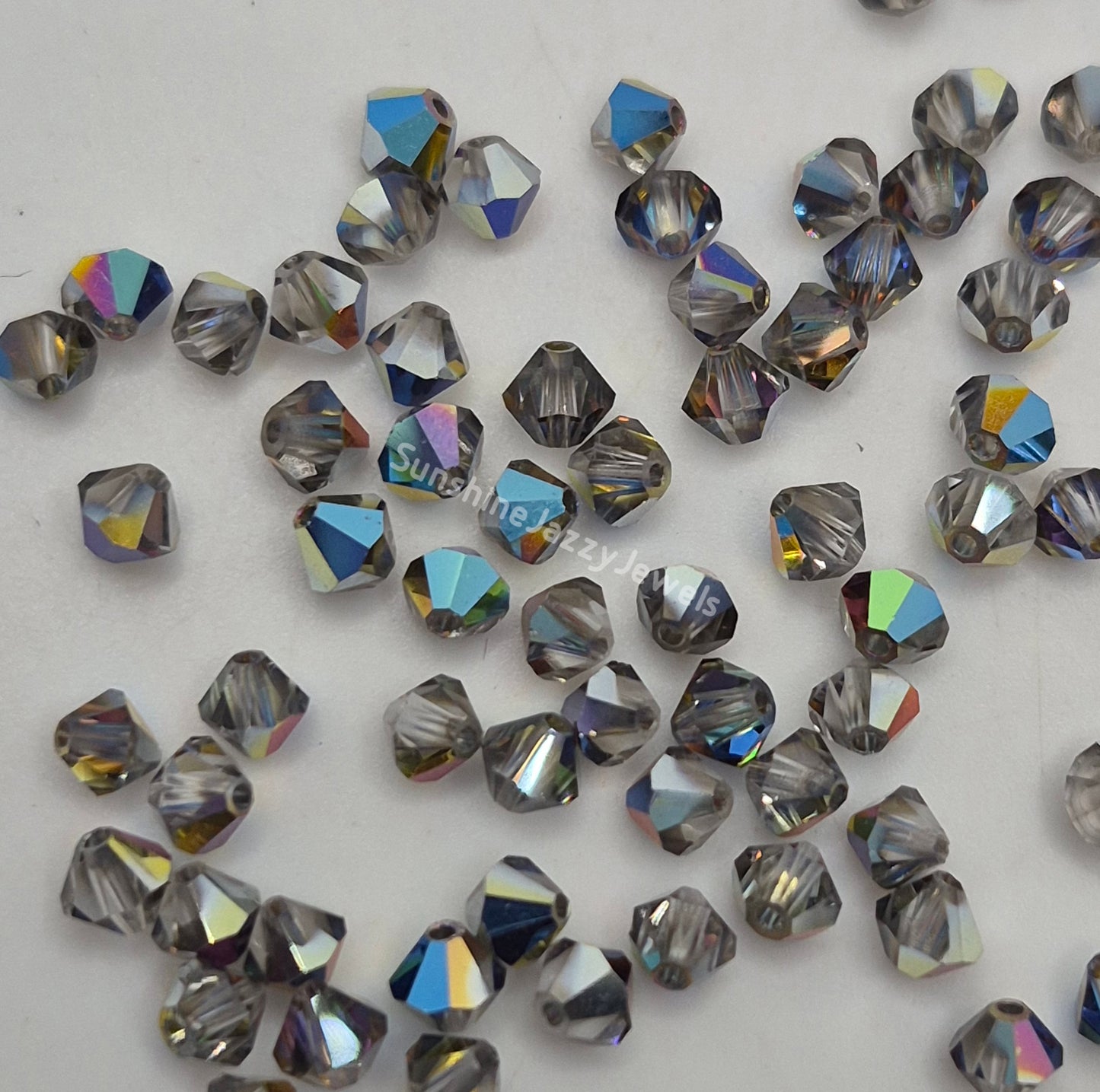 #5328 - Swarovski Crystal 4mm Bicone Beads - Crystal Effects; 24pc per pack