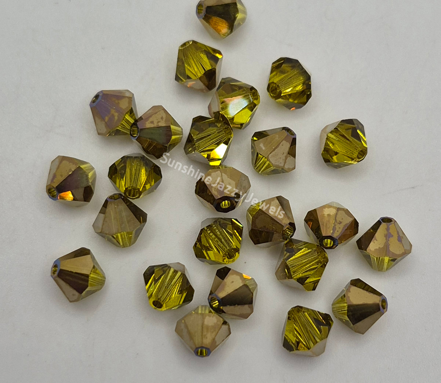 #5328 - Swarovski Crystal 6mm Bicone Beads; Crystal Effects; 12pc per pack