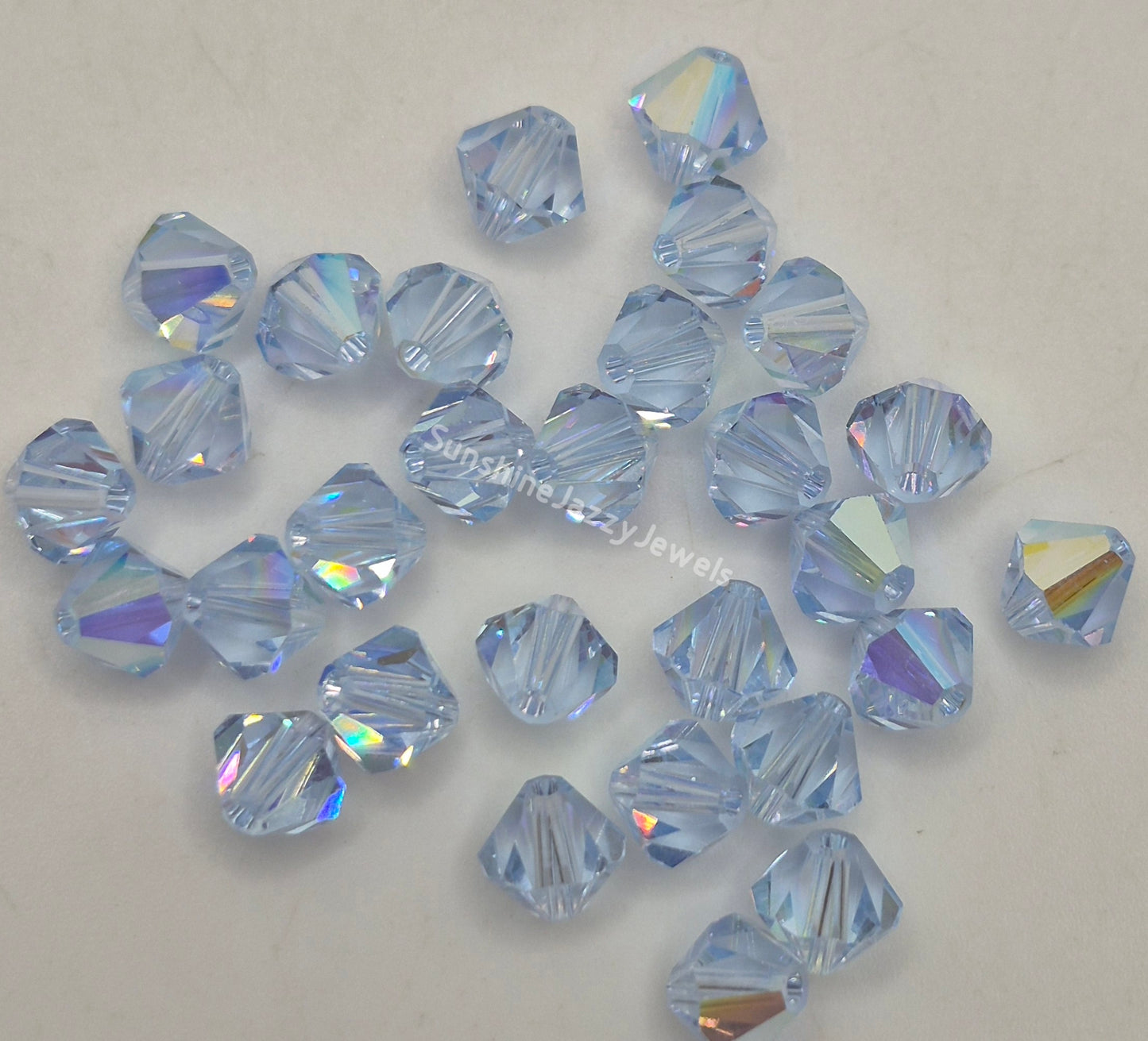#5328 - Swarovski Crystal 6mm Bicone w/ AB Finish; 12pc per pack