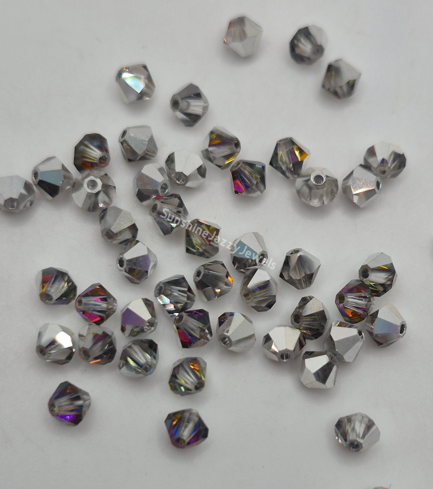 #5328 - Swarovski Crystal 4mm Bicone Beads - Crystal Effects; 24pc per pack