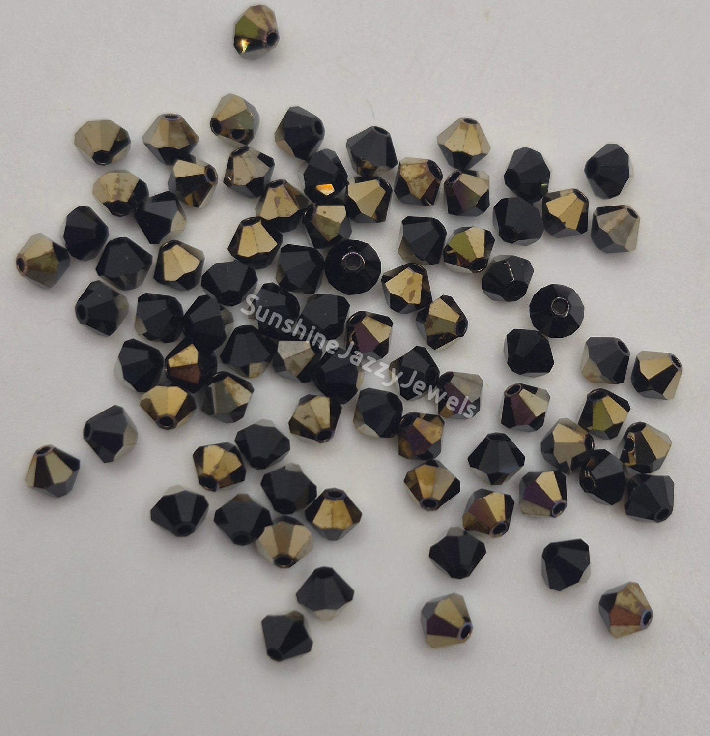 #5328 - Swarovski Crystal 6mm Bicone Beads; Crystal Effects; 12pc per pack