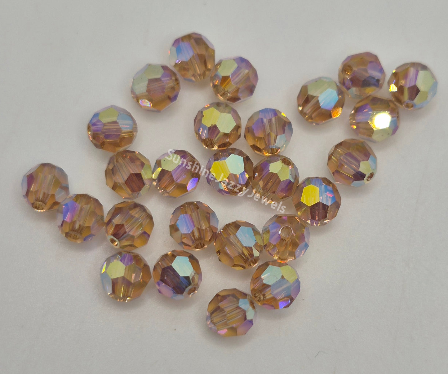 #5000 - Swarovski Crystal 6mm Round Beads w/ AB2X Effect; 12pc per pack