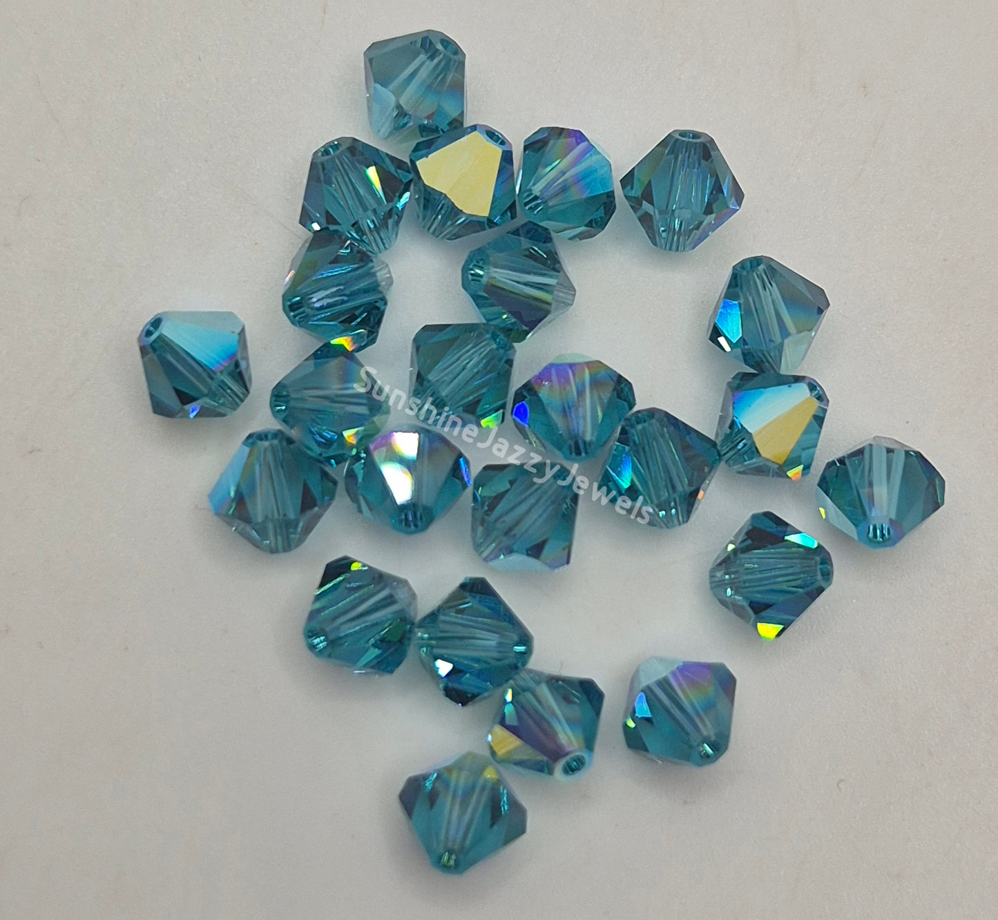 #5328 - Swarovski Crystal 8mm Bicone w/ AB Finish; Many Colors; 12pc per pack