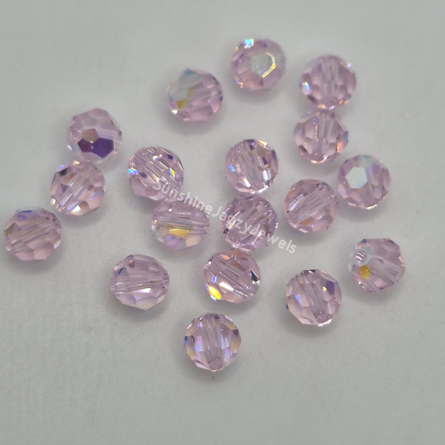 #5000 - Swarovski Crystal 6mm w/ AB Finish Faceted Round Beads; 12pc per pack