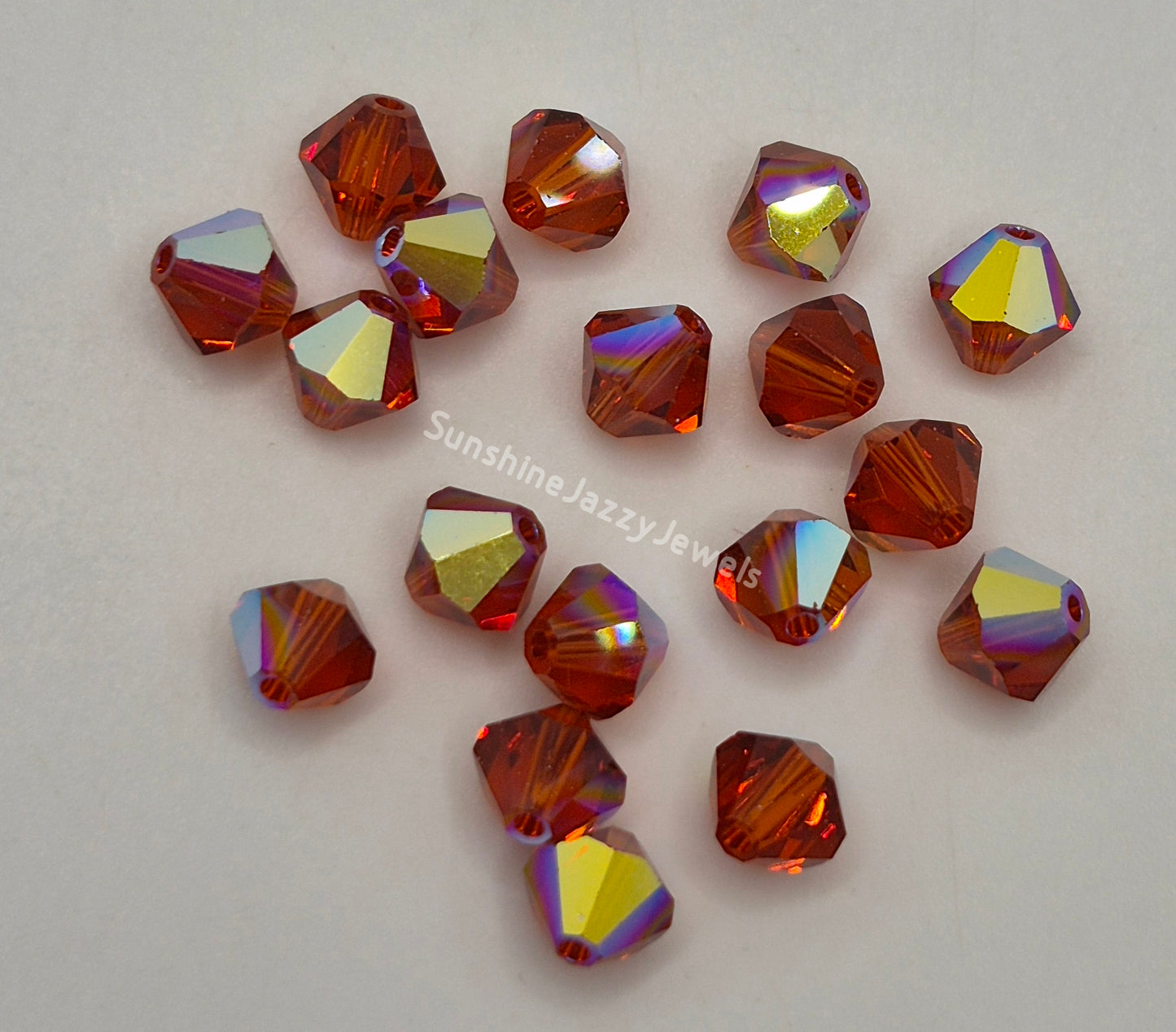 #5328 - Swarovski Crystal 6mm Bicone w/ AB Finish; 12pc per pack