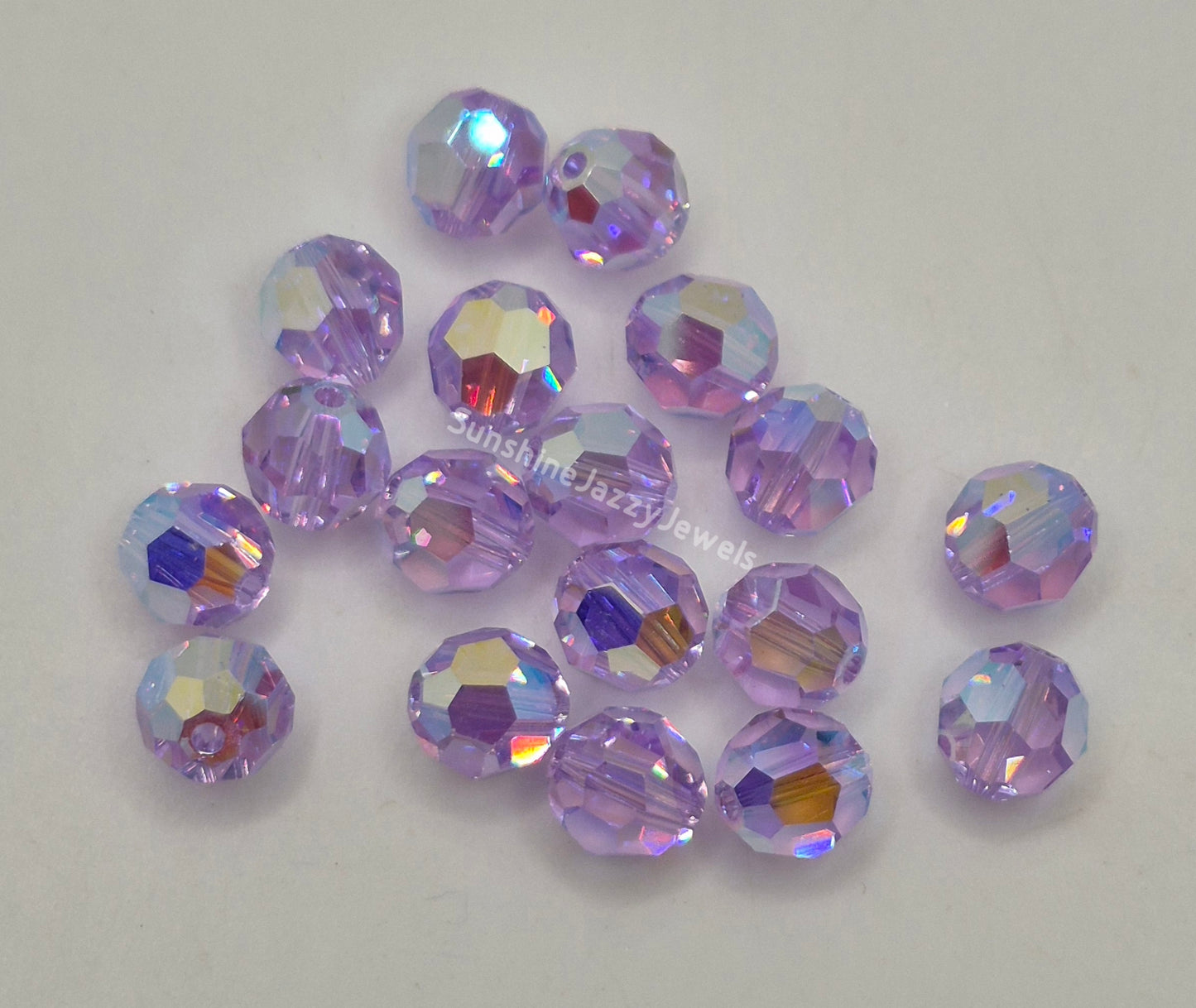 #5000 - Swarovski Crystal 8mm Round Beads w/ AB2X Effect; 6pc per pack