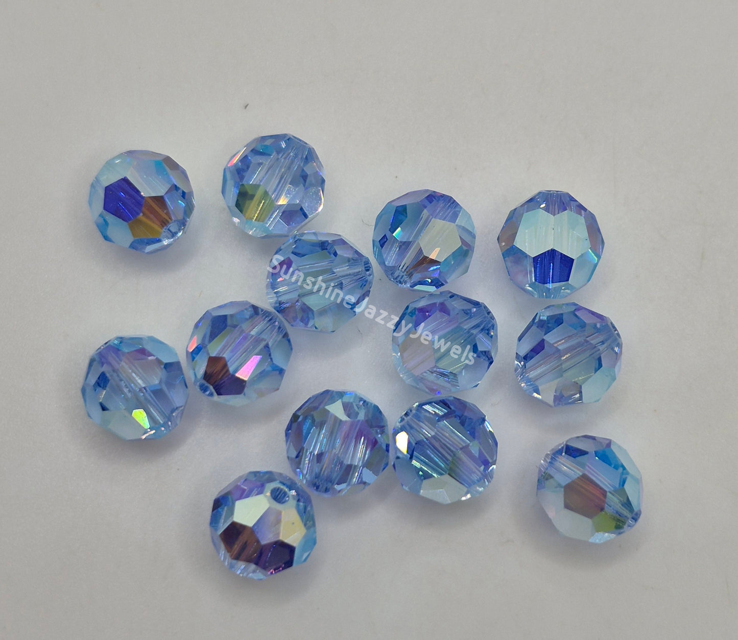 #5000 - Swarovski Crystal 8mm Round Beads w/ AB2X Effect; 6pc per pack
