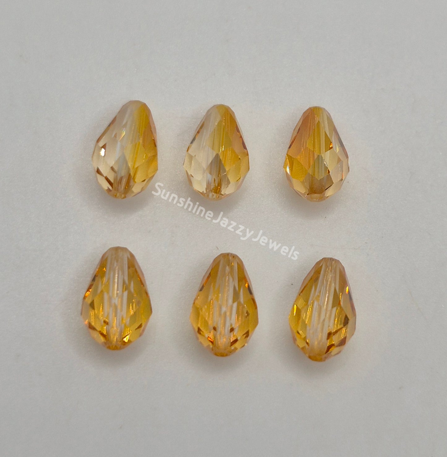 WEB EXCLUSIVE - #5500 - 6pc Swarovski Crystal Brandy Special Coating 9x6mm Teardrop Beads