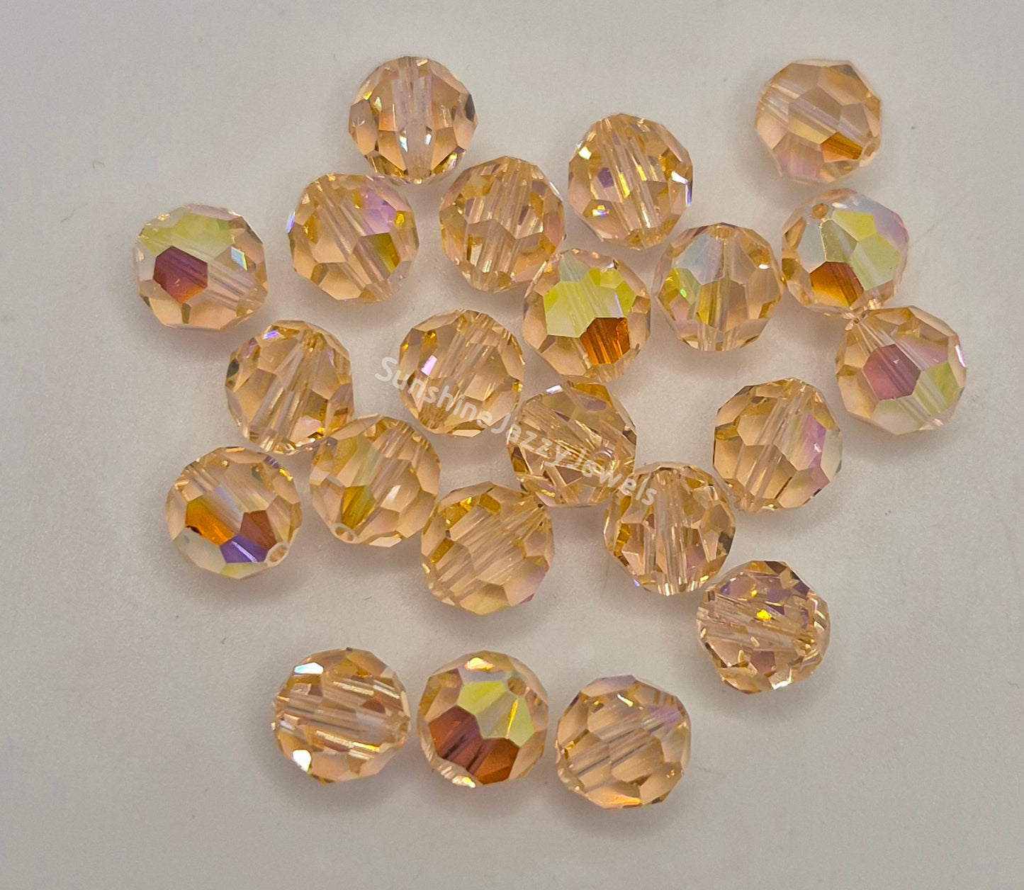 #5000 - Swarovski Crystal 8mm Round Beads w/ AB Finish; 6pc per pack