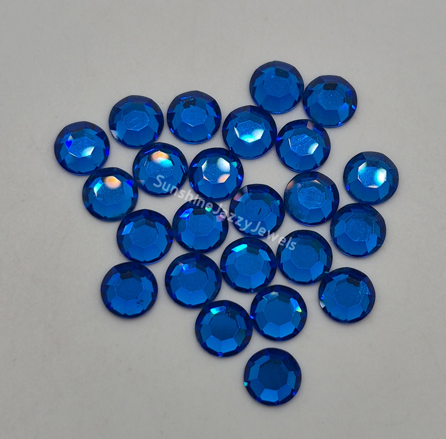 #2000 - Swarovski Crystal ss34 7mm Flatback Rhinestones; 12pc per pack; Multiple Colors