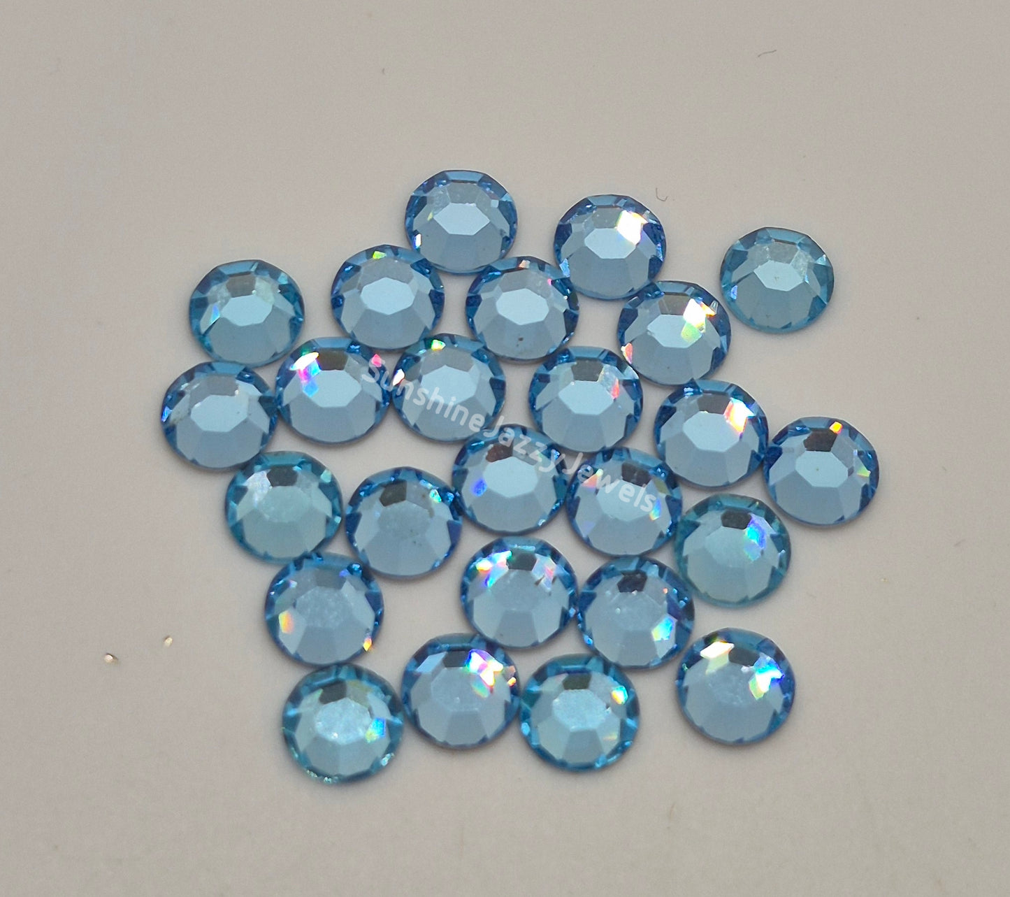 #2000 - Swarovski Crystal ss34 7mm Flatback Rhinestones; 12pc per pack; Multiple Colors