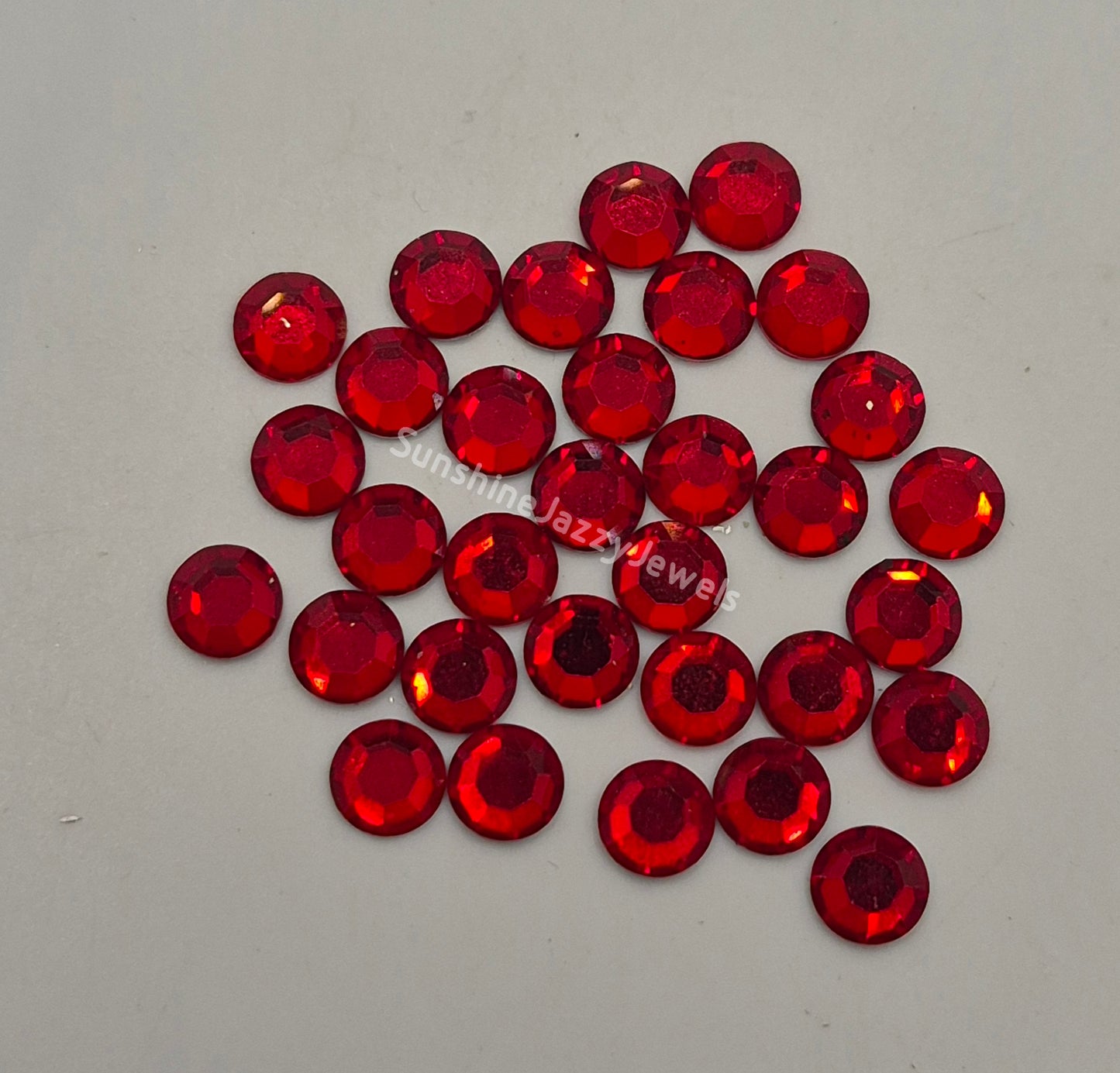 #2000 - Swarovski Crystal ss34 7mm Flatback Rhinestones; 12pc per pack; Multiple Colors