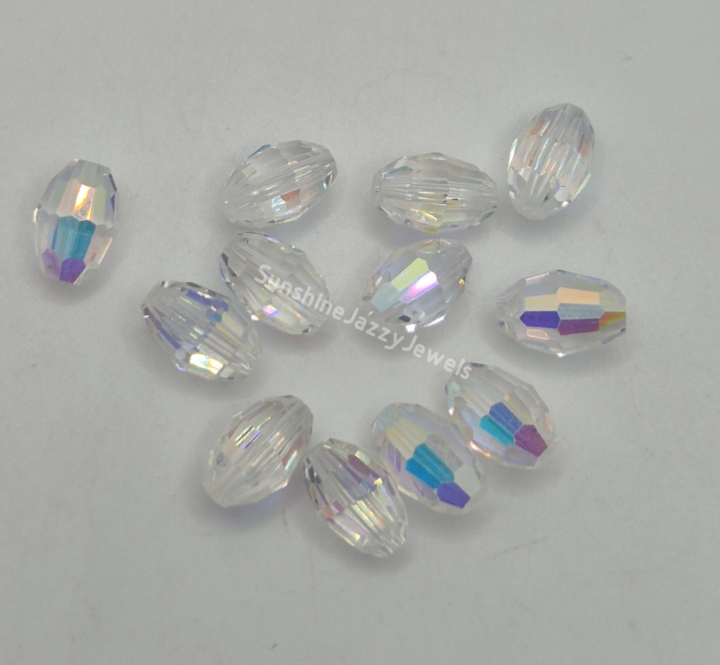 #5200 - Swarovski Crystal 9x6mm Oval Beads; AB Finish; 6pc per pack