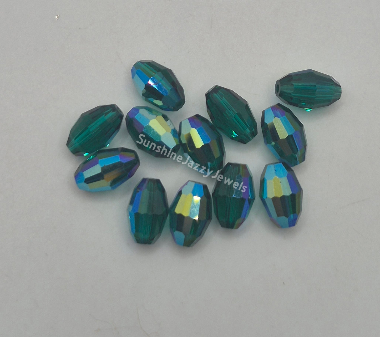 #5200 - Swarovski Crystal 9x6mm Oval Beads; AB Finish; 6pc per pack