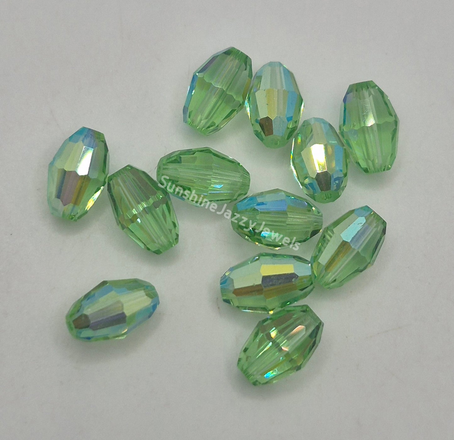 #5200 - Swarovski Crystal 9x6mm Oval Beads; AB Finish; 6pc per pack