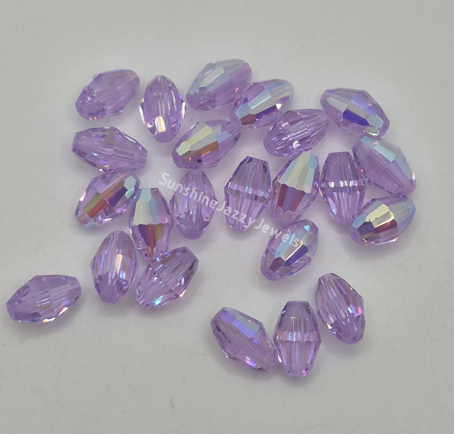 #5200 - Swarovski Crystal 9x6mm Oval Beads; AB Finish; 6pc per pack