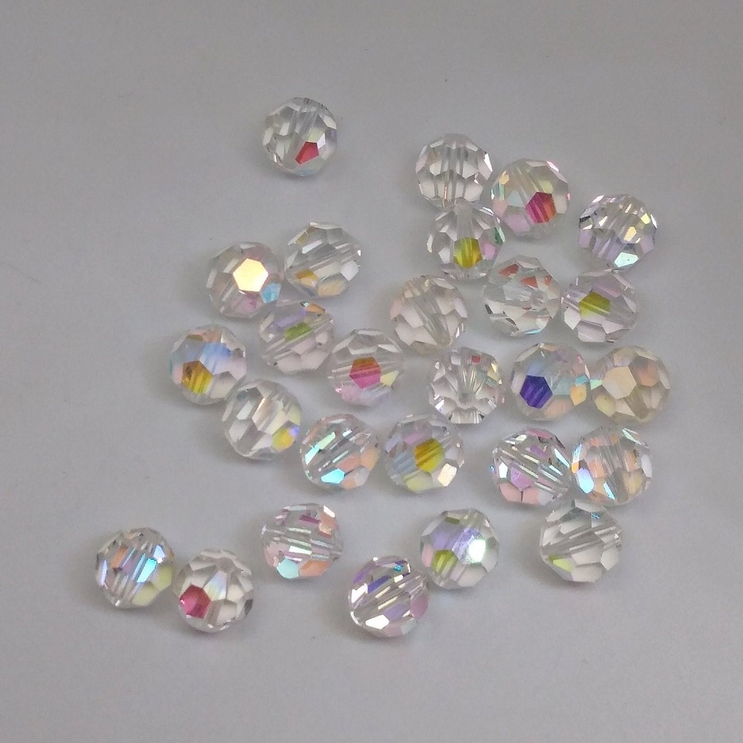 #5000 - Swarovski Crystal Clear AB Faceted Round Beads; 11 Sizes