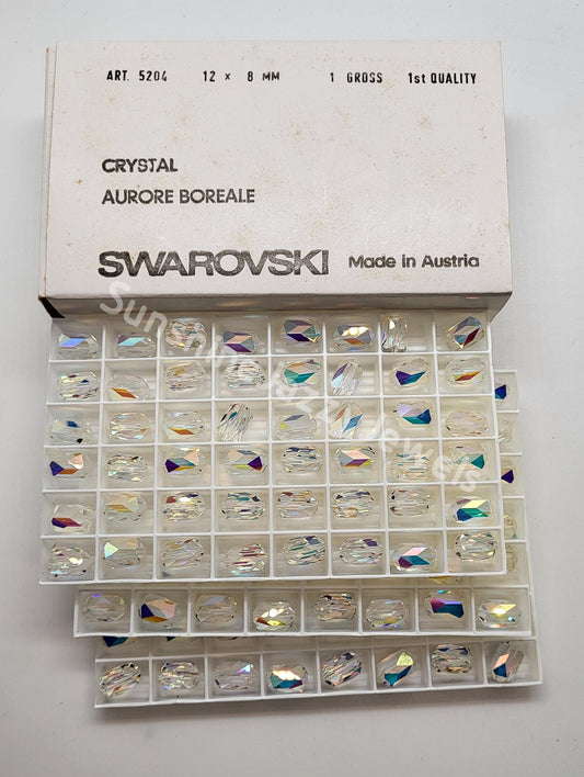 #5204 - Factory Pack Swarovski Crystal Clear AB 12x8mm Barrell Beads; 144pc